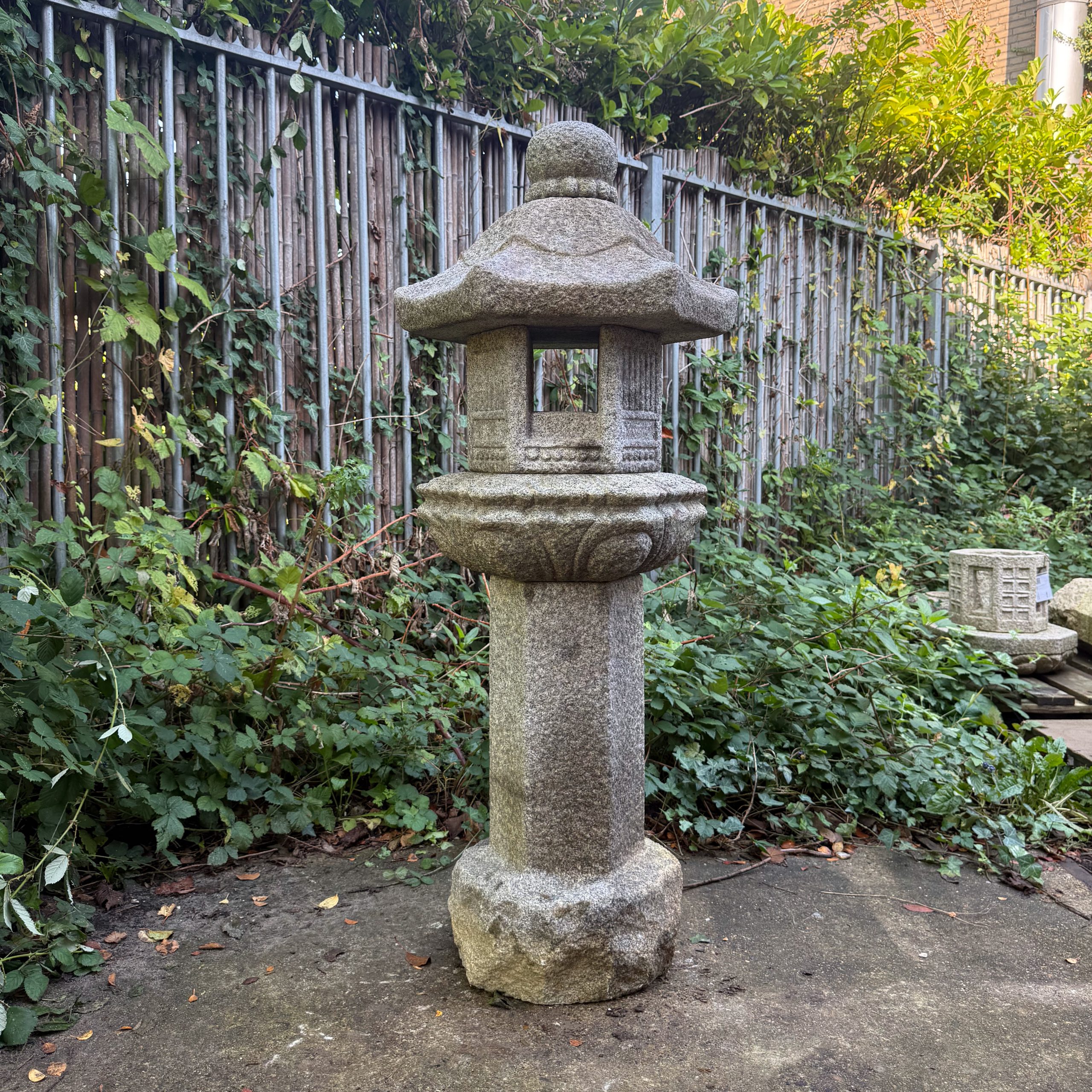 Five-part granite ‘buried’ garden lantern, known as Rokkaku ikekomi’dôrô